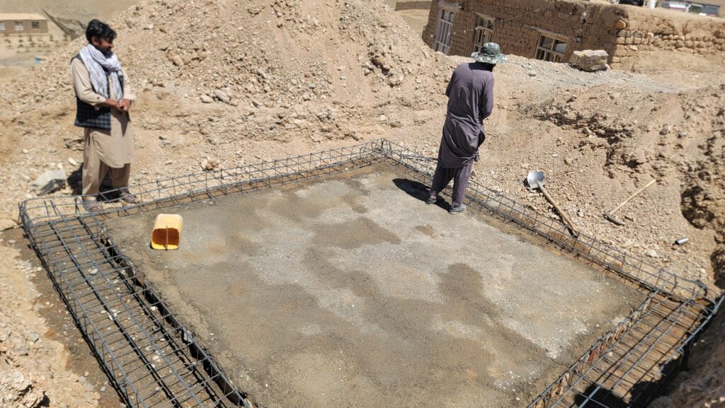 Villagers at a water supply point in Ghor