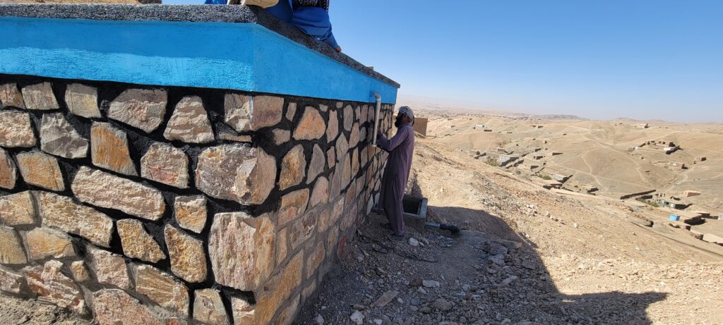 The completed stone water storage tank
